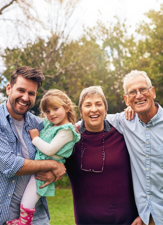 Happy multigenerational family smiling after comprehensive dental care at TRU Dentistry SoCo in South Austin, TX